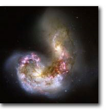 Collision of two galaxies © NASA